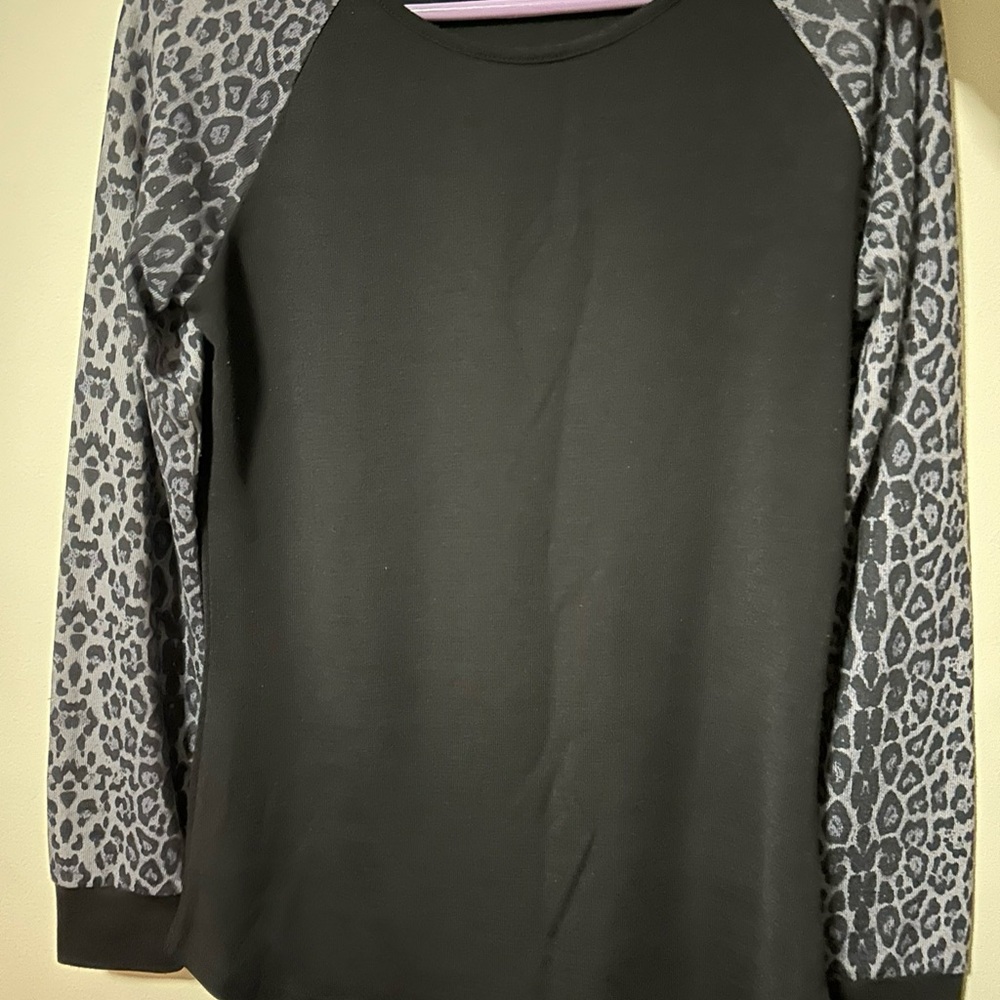 Elegant Black Top with Gray Leopard Sleeves